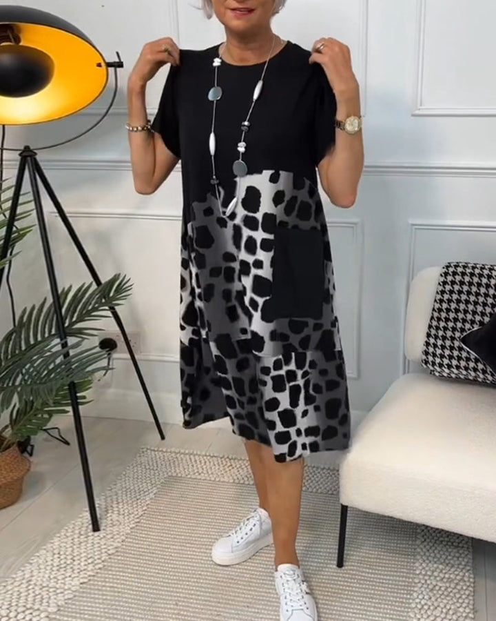 Allison - Stijlvolle midi-jurk met korte mouwen en luipaardprint