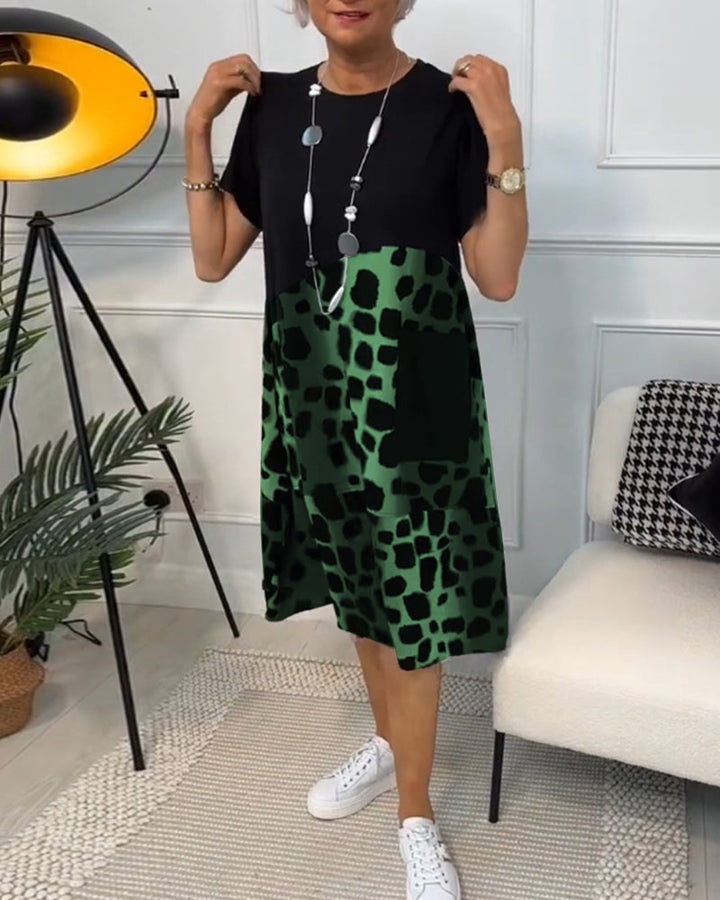 Allison - Stijlvolle midi-jurk met korte mouwen en luipaardprint