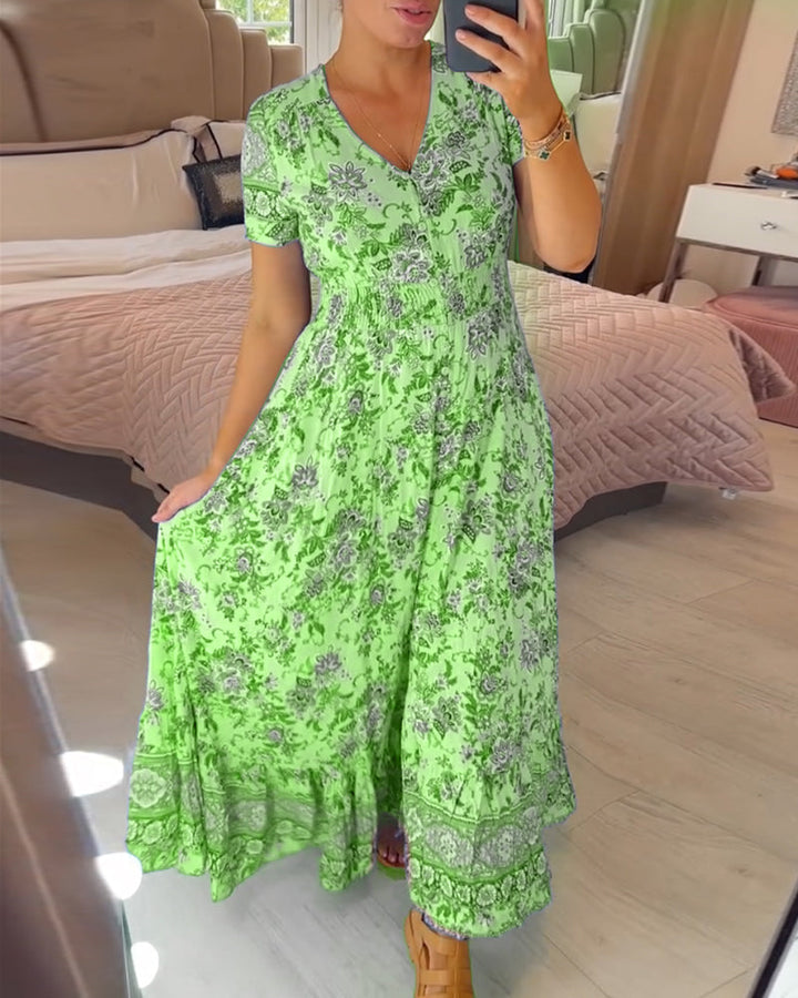Ellie - Elegante jurk met bloemenprint en V-hals en plooien