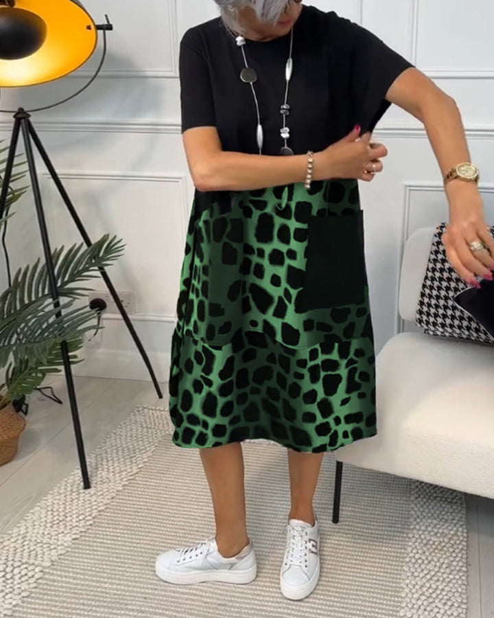 Allison - Stijlvolle midi-jurk met korte mouwen en luipaardprint