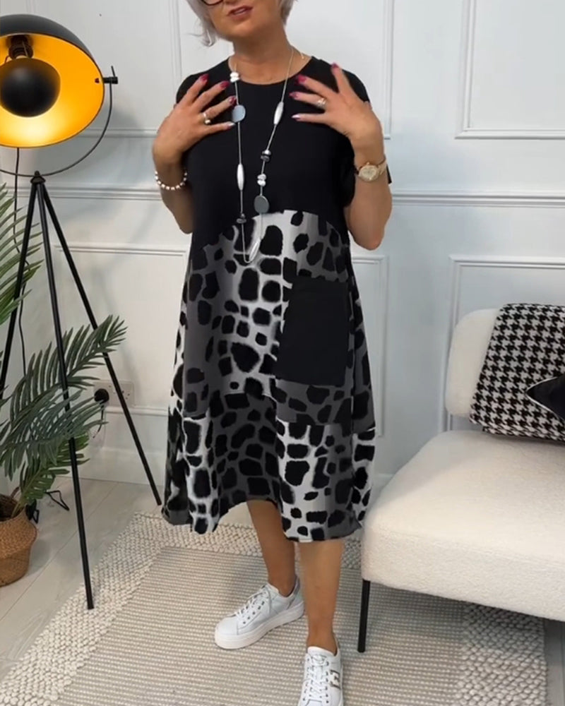 Allison - Stijlvolle midi-jurk met korte mouwen en luipaardprint