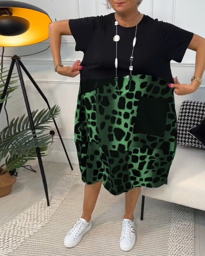 Allison - Stijlvolle midi-jurk met korte mouwen en luipaardprint