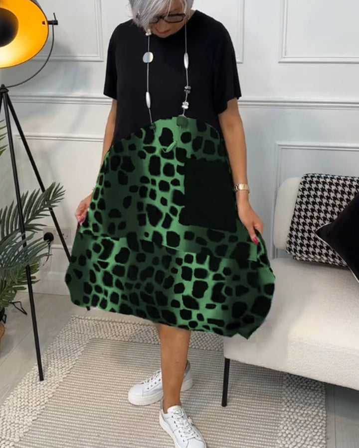 Allison - Stijlvolle midi-jurk met korte mouwen en luipaardprint