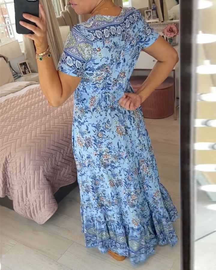 Ellie - Elegante jurk met bloemenprint en V-hals en plooien