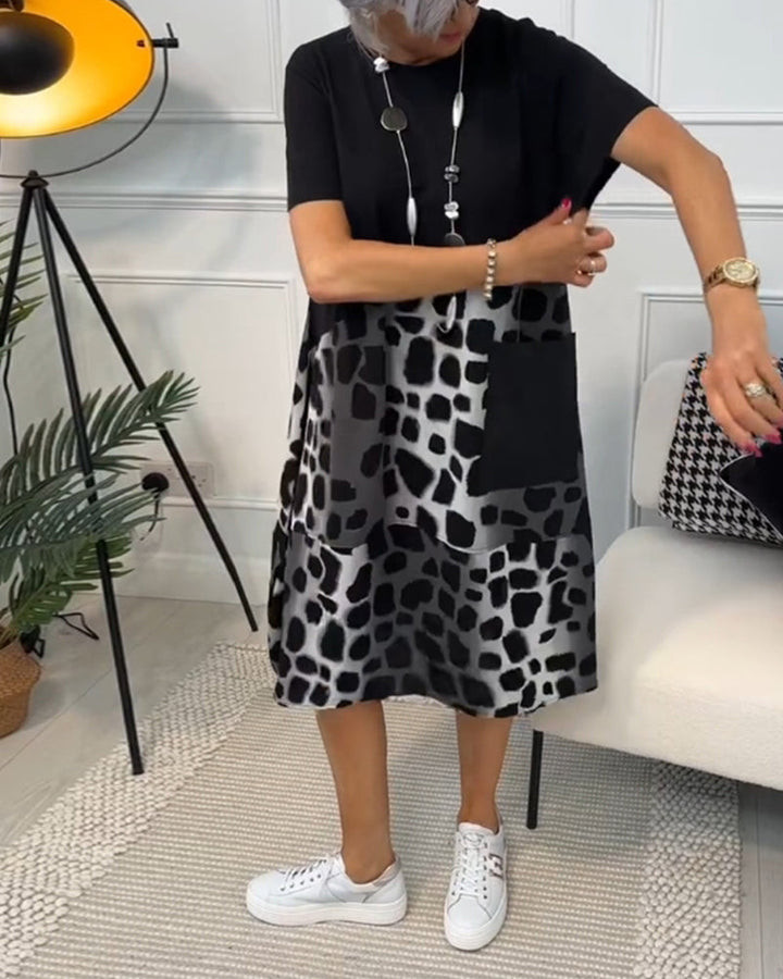 Allison - Stijlvolle midi-jurk met korte mouwen en luipaardprint