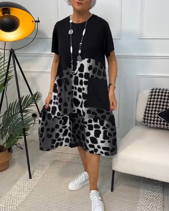 Allison - Stijlvolle midi-jurk met korte mouwen en luipaardprint