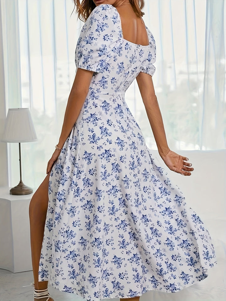 Calyx - Artistieke jurk met bloemenprint en pofmouwen