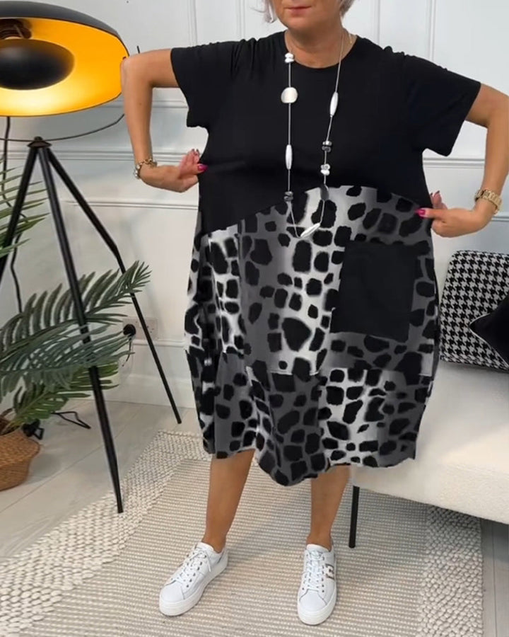Allison - Stijlvolle midi-jurk met korte mouwen en luipaardprint