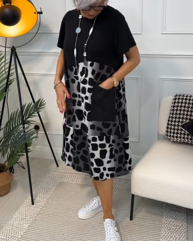 Allison - Stijlvolle midi-jurk met korte mouwen en luipaardprint