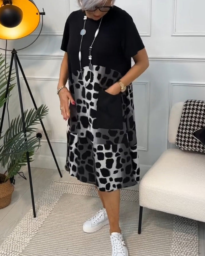 Allison - Stijlvolle midi-jurk met korte mouwen en luipaardprint