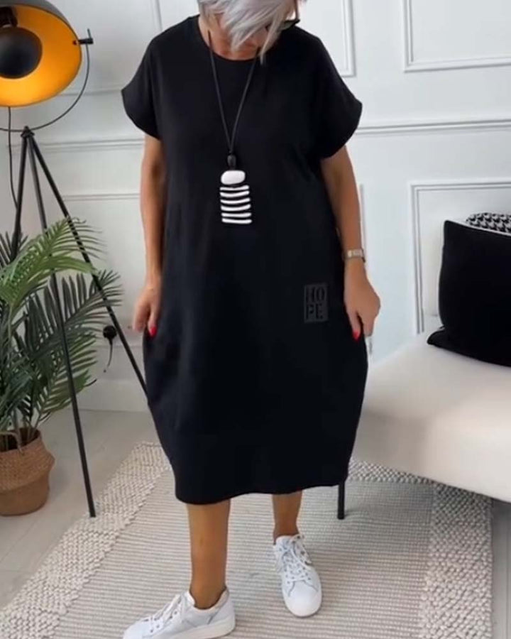 Cleo - Stijlvolle jurk met korte mouwen