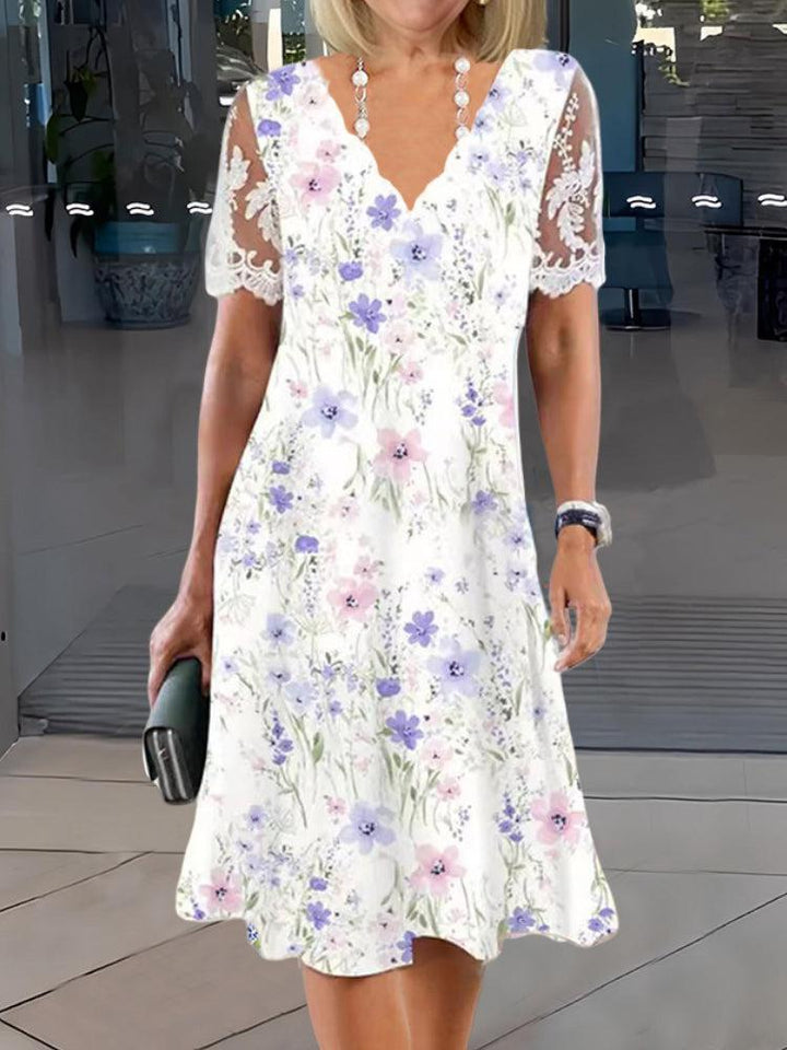Harlyn - Zoete bloemenkant patchwork midi-jurk