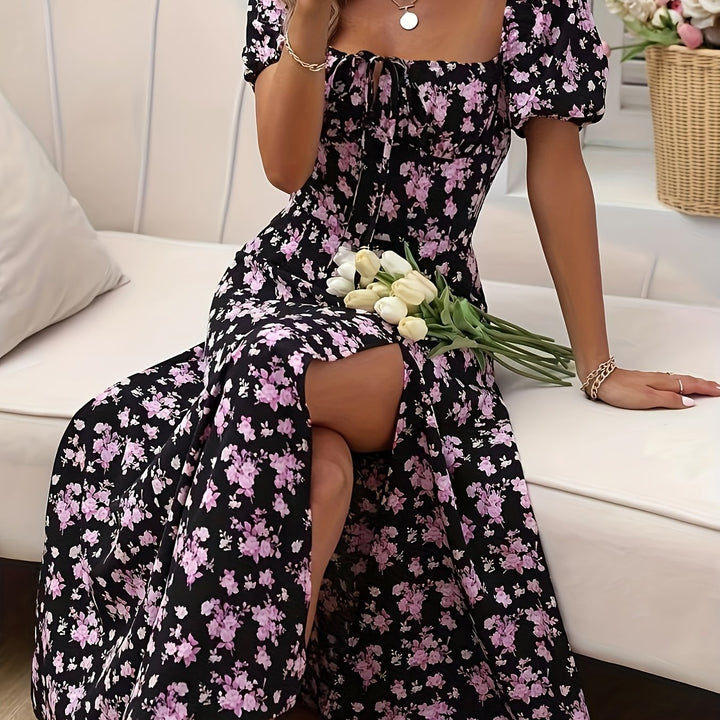 Calyx - Artistieke jurk met bloemenprint en pofmouwen