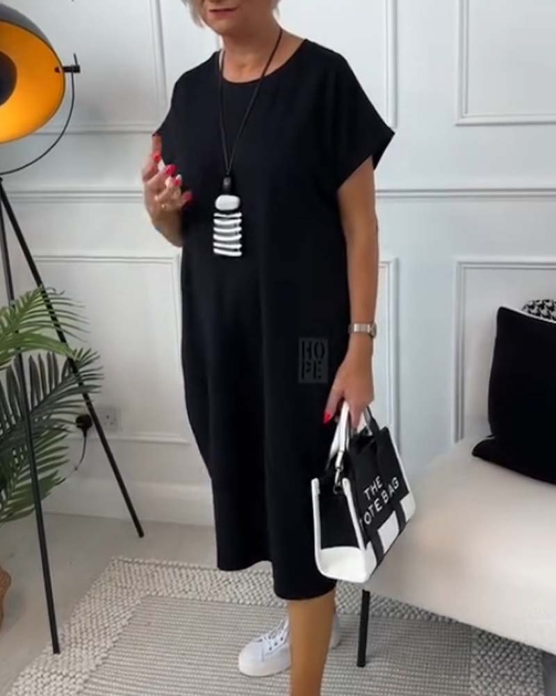 Cleo - Stijlvolle jurk met korte mouwen