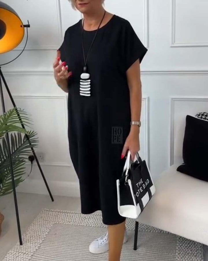 Cleo - Stijlvolle jurk met korte mouwen
